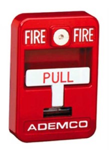 A fire alarm that is red and white